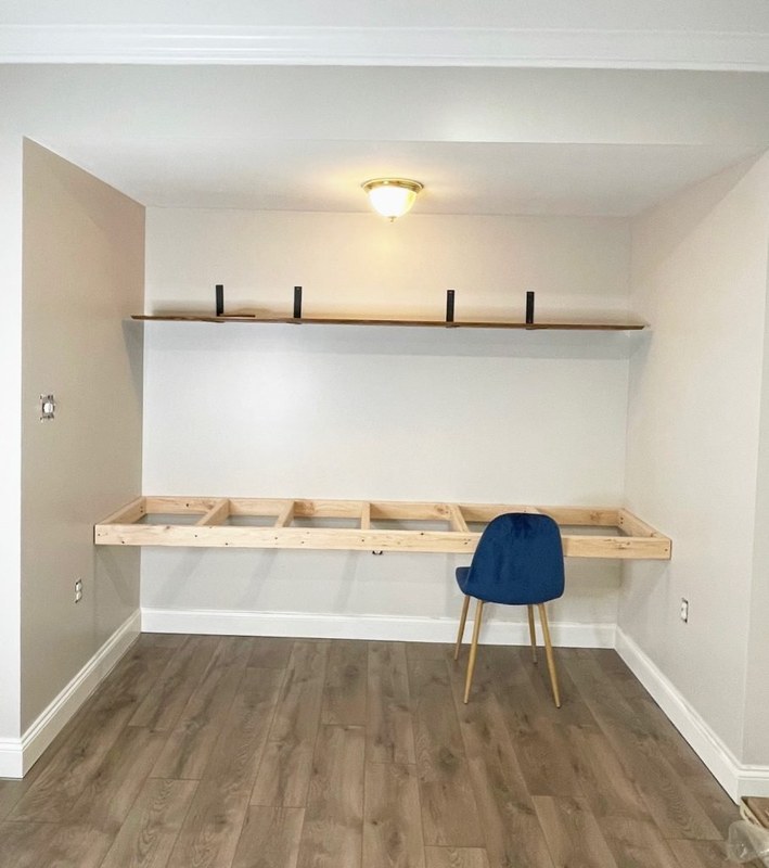 Measuring a wall for a floating desk with notes on wall type, room fit, and desk dimensions