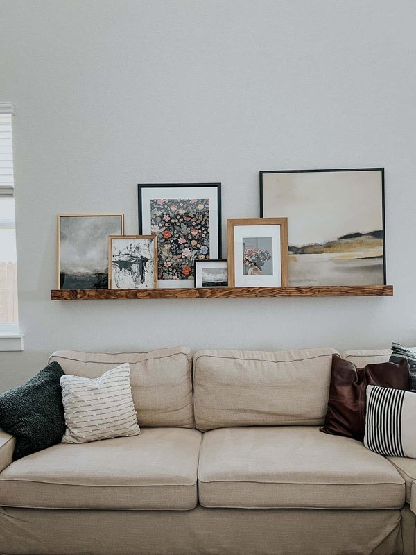 How High to Hang Picture Ledges Above a Sofa