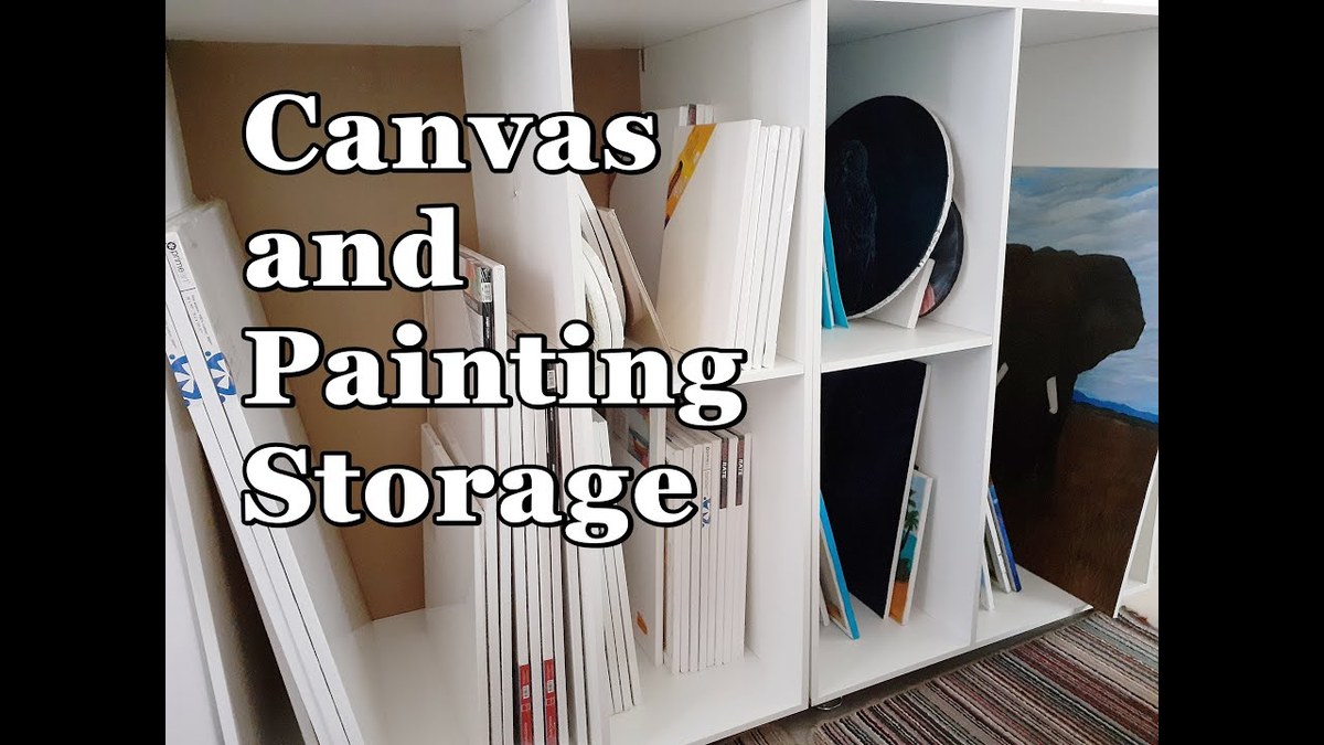 Person inspecting a canvas painting and frame before home storage, checking for damage and loose hardware